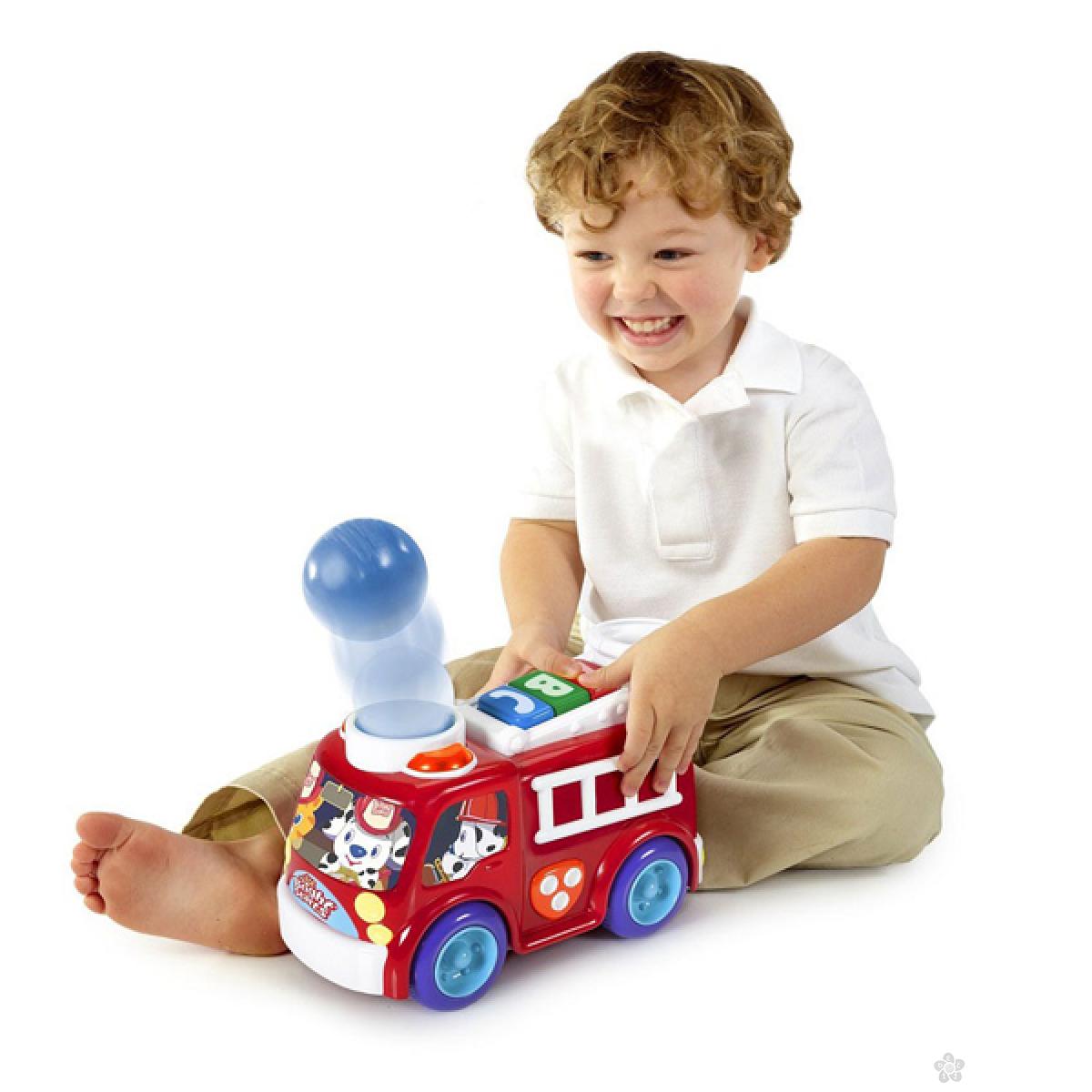 Muzičke igračke Kids II Roll & Pop Fire Truck SKU52137 | Dečji sajt