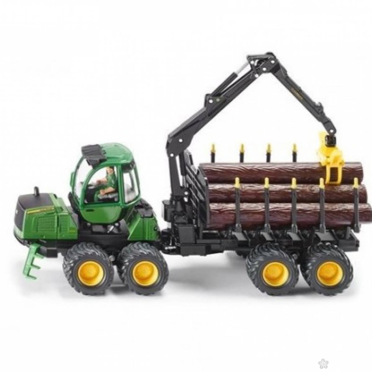 Traktor John Deer 1210E, sa  drvima i  prikolicom 021337 